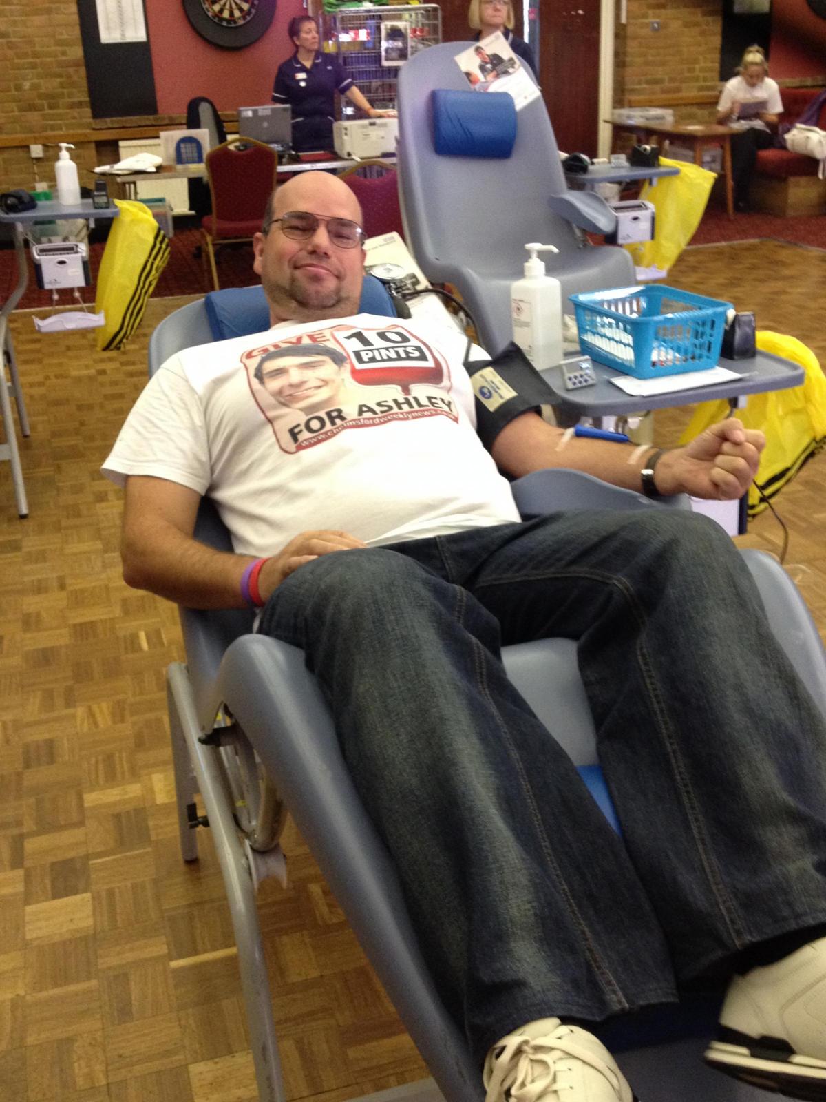Trevor gives his donation - the first of 86 appointments.