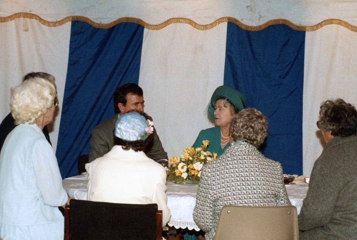 In the presence of royalty - selected volunteers and staff took turns to sit with the Queen Mother
