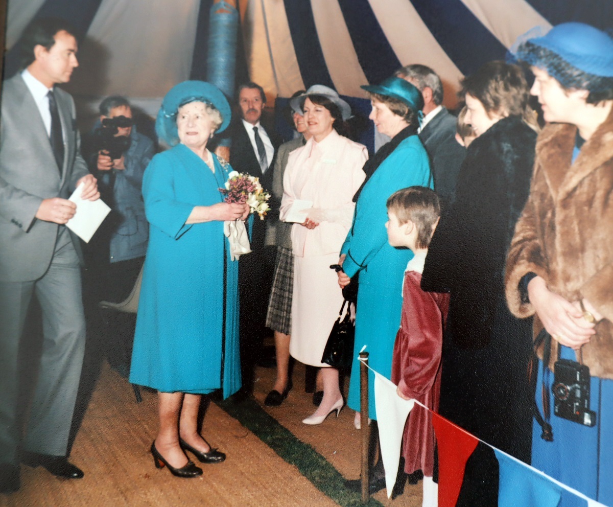 Original team - chairman Christopher Holmes introduces the Queen Mother to some of those who worked tirelessly to establish St Helena Hospice. They are Allan Crabtree (centre), who dealt with all PR, Joy Higgins (wearing pink), personal assistant to Pat