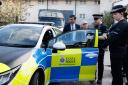 Prime Minister Rishi Sunak is shown a new Electric Hybrid deployment police car while visiting Harlow Police Station
