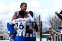 Team spirit - Colchester United's players celebrate after scoring at Sutton United