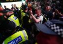 England fans clash with police in Piccadilly Circus, London, after Italy beat England on penalties. Picture: PA