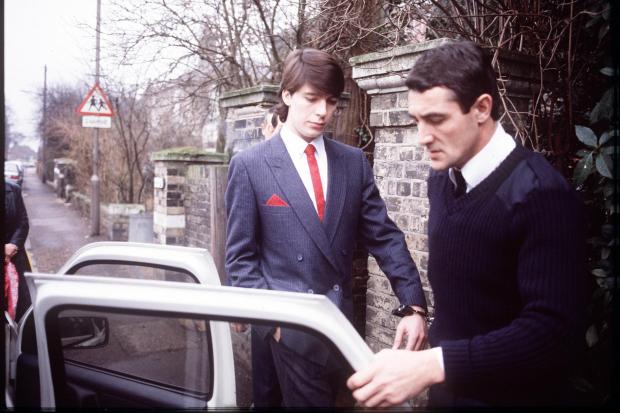 Chelmsford Weekly News: Jeremy Bamber in handcuffs, escorted by police. Picture: PA Photo/Anglia Press Agency/Archived via SWpix.com