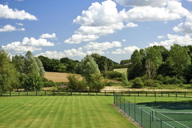 Chelmsford Weekly News: Let's play - the garden has plenty of space and a tennis court for some sport