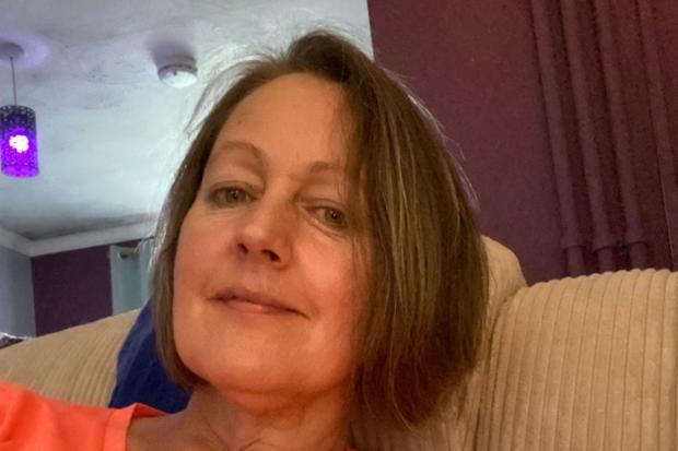 Chelmsford Weekly News: Scharrowne Farmer, 54, from Essex, is living with "debilitating" pain despite four operations to save the digit. Picture: SWNS 