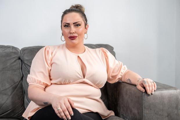 Ellesha McKay, 27, works as a porn star and dominatrix from her flat in Essex. Picture: SWNS