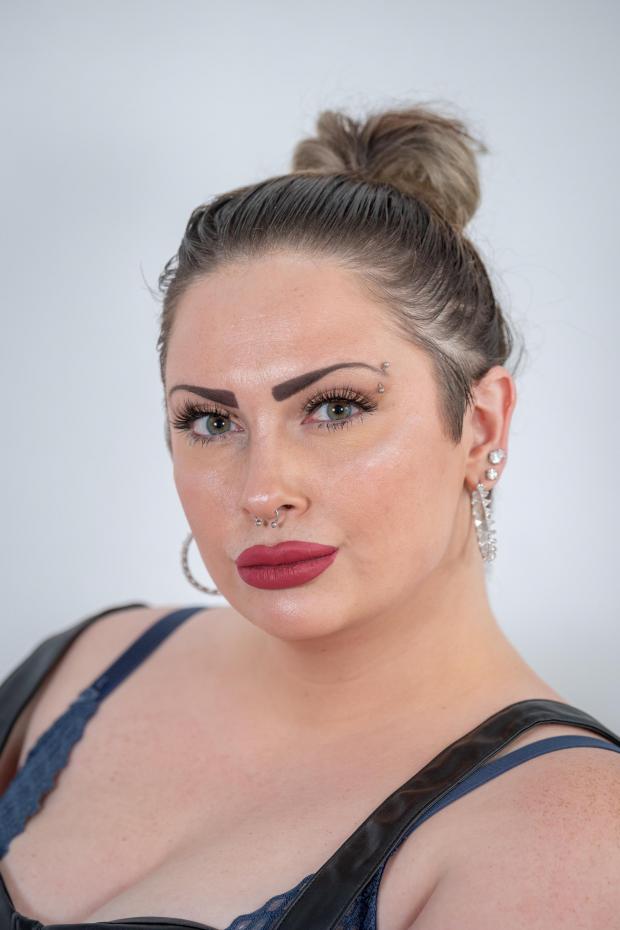 Chelmsford Weekly News: Ellesha McKay, 27, works as a porn star and dominatrix from her flat in Essex. Picture: SWNS