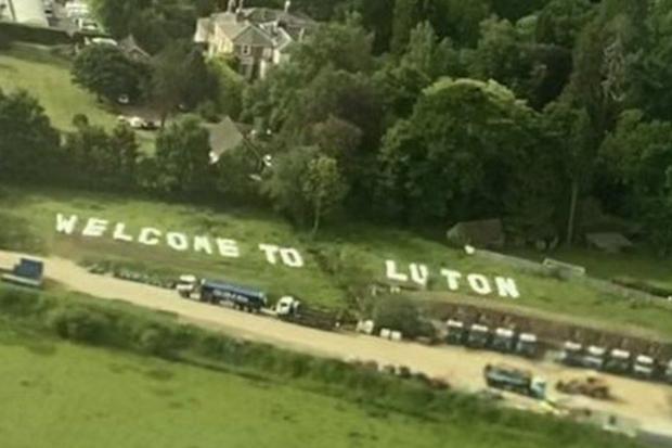 'Welcome to Luton' sign panics passengers landing at Gatwick Airport. Photo by Abbey Desmond