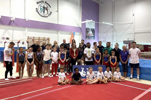 Chelmsford Weekly News: Max Whitlock (left), Georgia-Mae Fenton (centre) and Courtney Tulloch poses for photographers at the South Essex Gymnastics Club (PA)