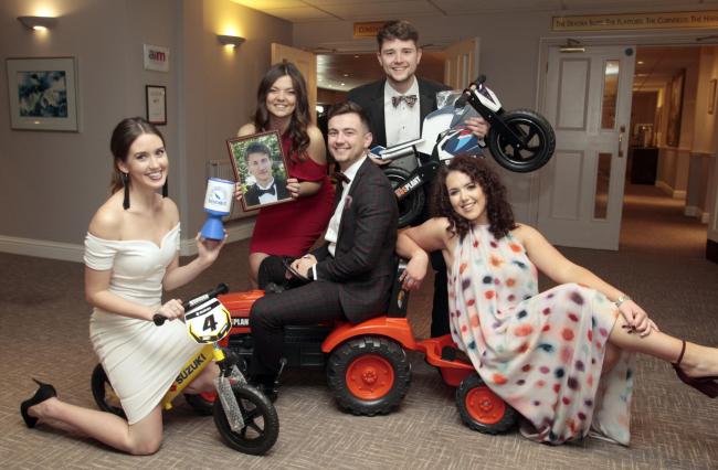 Old pals - Tom's school friends Charly Peek, Holly Morgan, Charlie Morgan, Tom Bailey and Lawren Easter pose with auction items